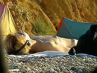 I was camping with some of my friends and I found out that they liked to sunbath in the nude. I seized the chance and I recorded them on this nudism video while they were naked.