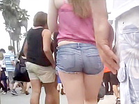 Hot ginger teen got on the hidden voyeur camera of our naughty hunter with her candid ass tightly wrapped into the jeans shorts