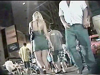 This is the up skirt video in which the young bimbo is flashing her fresh upskirt but she does not know about it